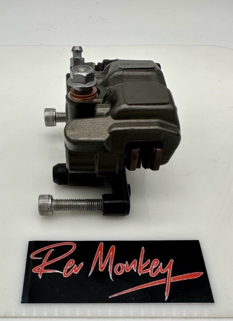 SURRON ULTRA BEE FRONT BRAKE CALIPER ASSEMBLY