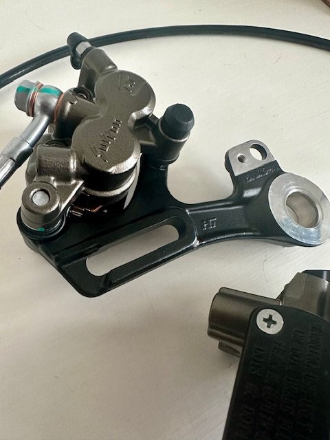 SURRON ULTRA BEE REAR BRAKE ASSEMBLY COMPLETE