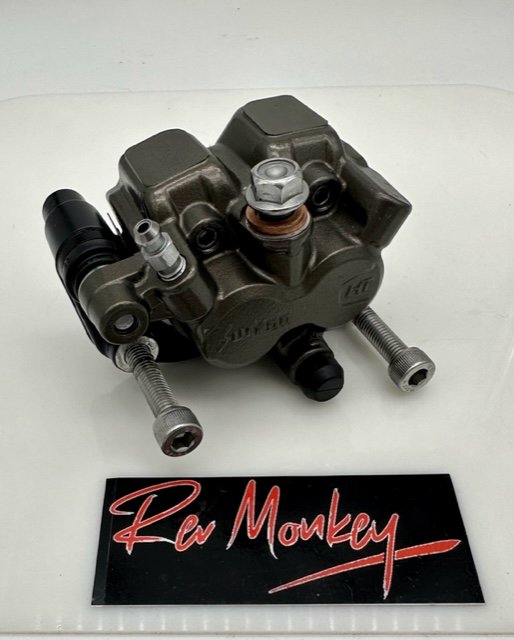 SURRON ULTRA BEE FRONT BRAKE CALIPER ASSEMBLY