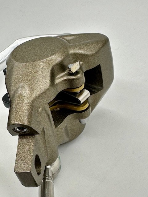 SURRON HYPER BEE REAR BRAKE ASSEMBLY